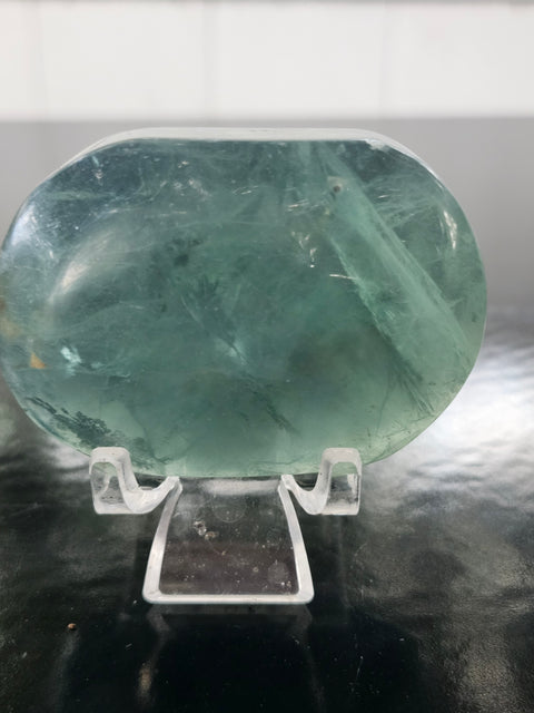Green florite palm stone! 3.4 ounces, 2.5 inches wide, 1.8 tall