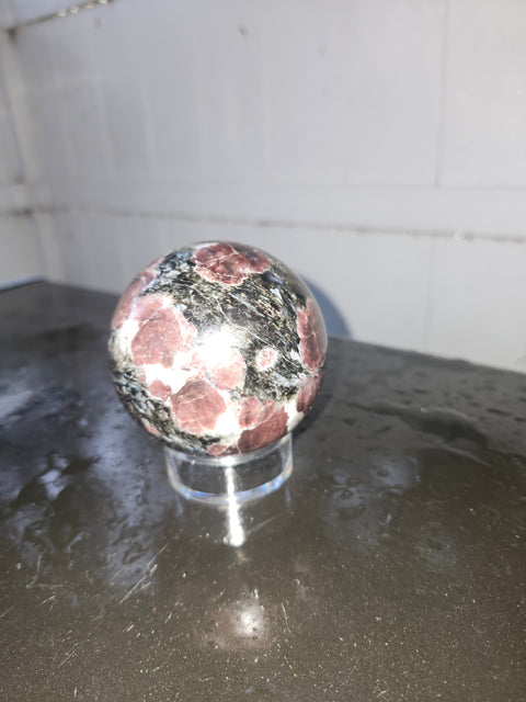 1.5 pound, 69.6mm, 2.74 inch Astrophyllite garnet fireworks sphere