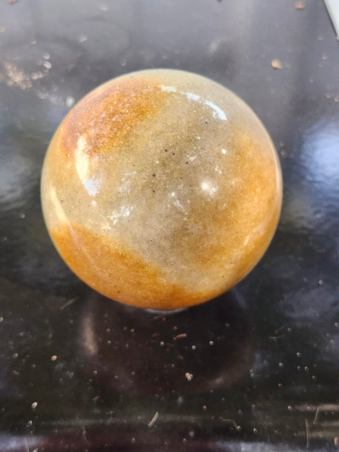 Green and gold aventurine sphere with silver flash 1.4 pounds, 74mm