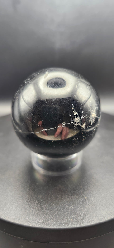 Black tourmaline sphere. 49.8mm, 1.96 inches, 7 ounces