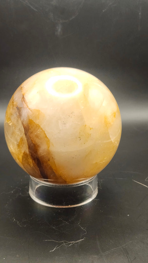 Ferruginous quartz sphere. 71.6mm, 2.82 inches, 1.2 pounds