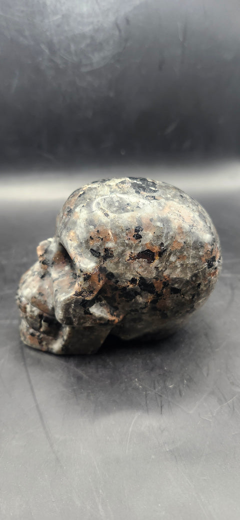 Flame stone "yooperlite" skull! 3 inches tall, 3 long, 14 ounces