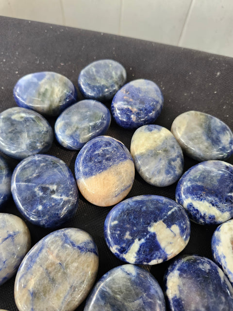 1.5 ounce, 1.75 inch sodalite palm stone uv reactive