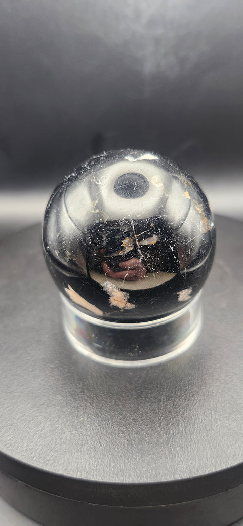 Black tourmaline sphere. 49.6mm, 1.95 inches, 7 ounces