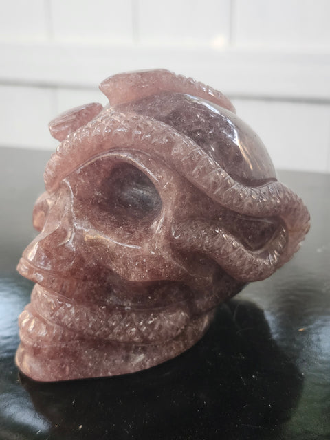 Strawberry quartz skull & snake! 1.6 pounds, 3.9 inches long, 3.3 tall, 2.7 wide