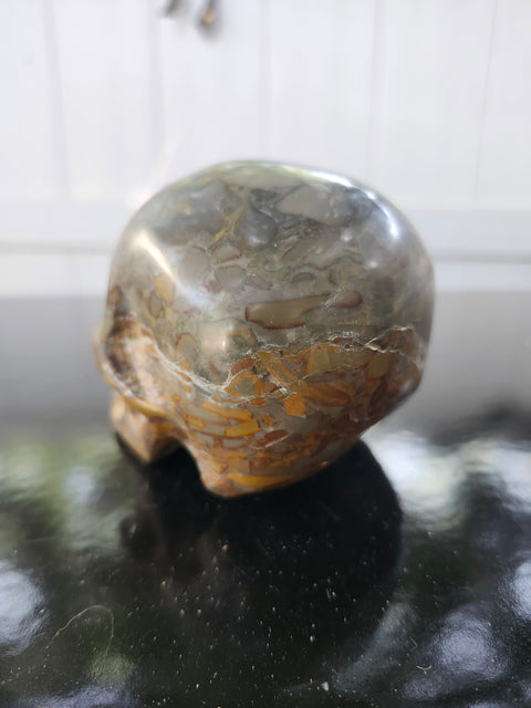 Fruit jasper skull, 1.3 pounds, 3.75 inches long, 3 inches tall, 2.5 inches wide