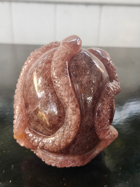 Strawberry quartz skull & snake! 1.6 pounds, 3.9 inches long, 3.3 tall, 2.7 wide