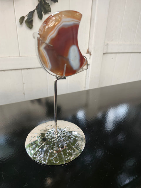 5.4 ounce carnelian moon with zodiac stand