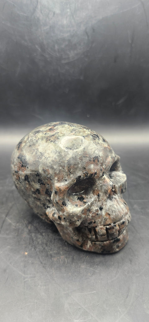 Flame stone "yooperlite" skull!! 3 inches tall, 3 long, 15 ounces