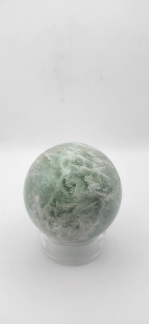 Snowflake florite sphere. 59.6mm, 2.34 inches, 12.4 ounces