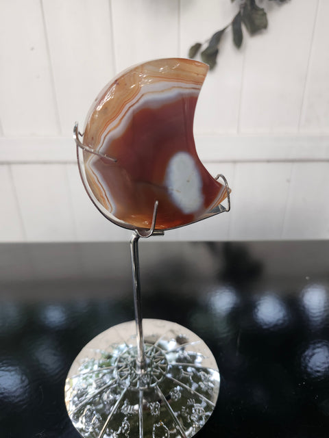 5.4 ounce carnelian moon with zodiac stand
