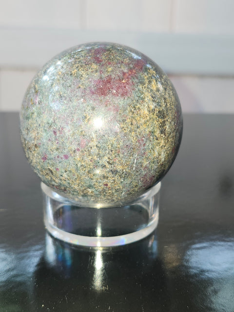 13 ounce ruby in kyanite sphere!! Uv reactive, 58 mm,2.3 inches