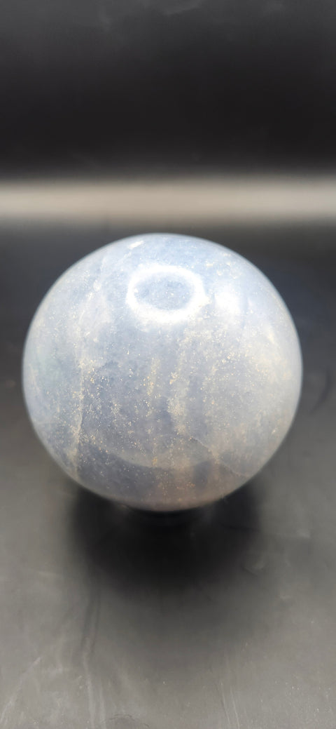 Blue calcite sphere. 62mm, 2.44 inches, 12 ounces