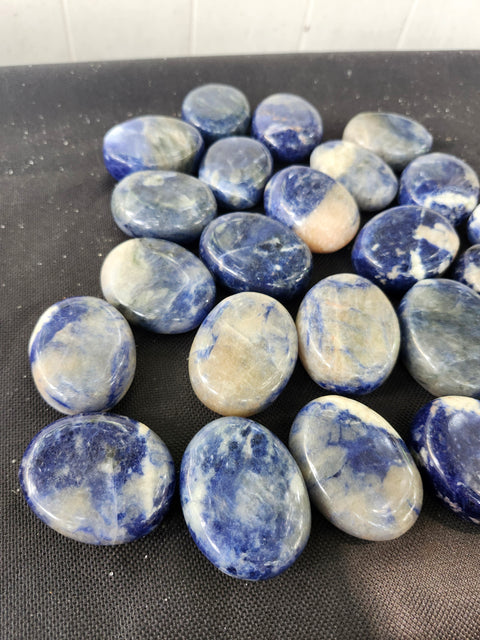1.5 ounce, 1.75 inch sodalite palm stone uv reactive