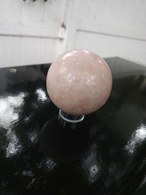 1.1, 69.8mm, 2.75 inch pound rose quartz sphere
