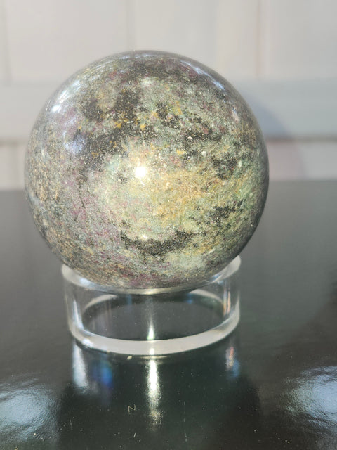 13 ounce ruby in kyanite sphere!! Uv reactive, 58 mm,2.3 inches