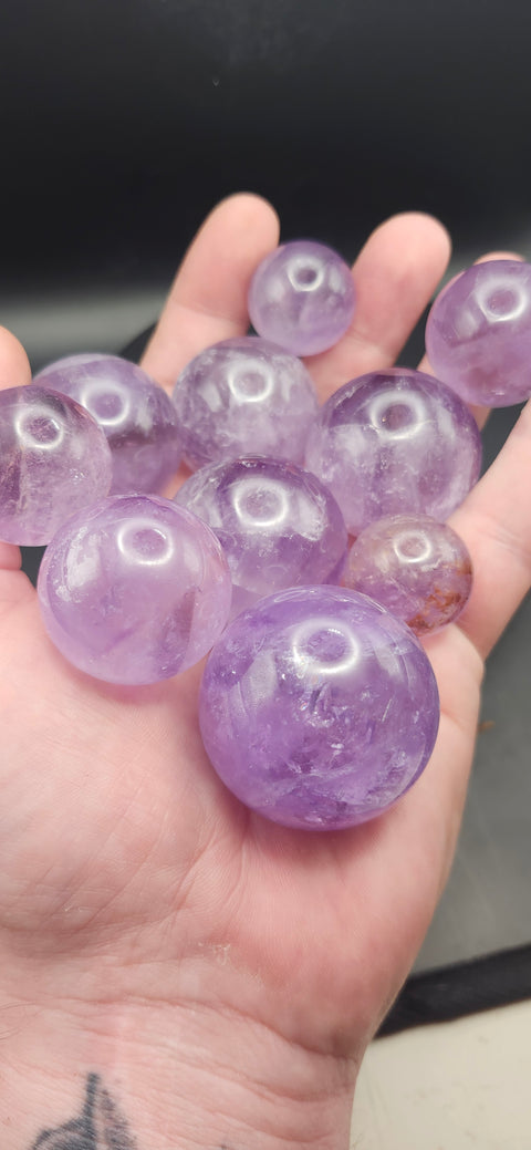 Amethyst quartz spheres set of 2. 1.3 inch and .9 inch