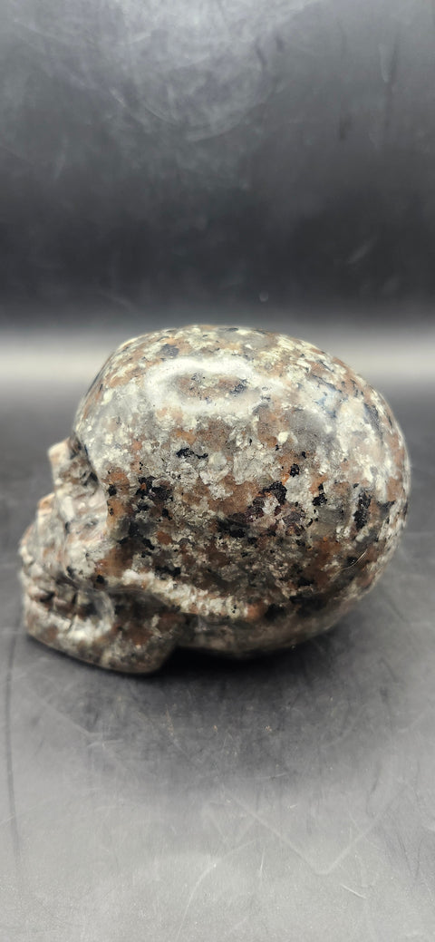 Flame stone " yooperlite" skull! 3 inches tall, 3 long, 14.7 ounces