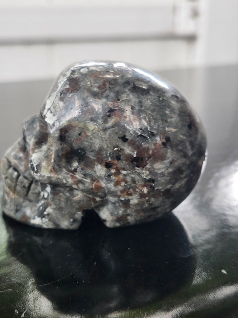 Mini flame stone skull! 5.8 ounces, 2.7 inches long, 2.1 tall