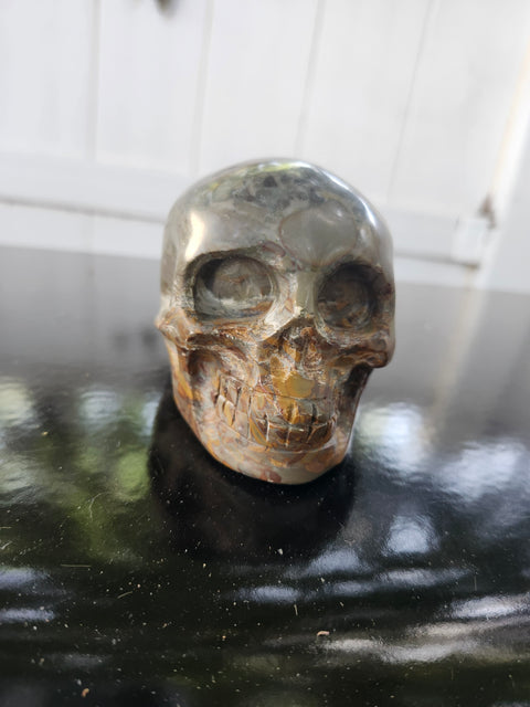 Fruit jasper skull, 1.3 pounds, 3.75 inches long, 3 inches tall, 2.5 inches wide