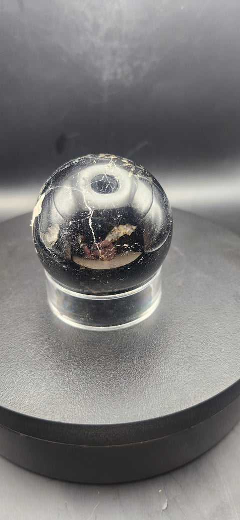 Black tourmaline sphere. 49.6mm, 1.95 inches, 7 ounces