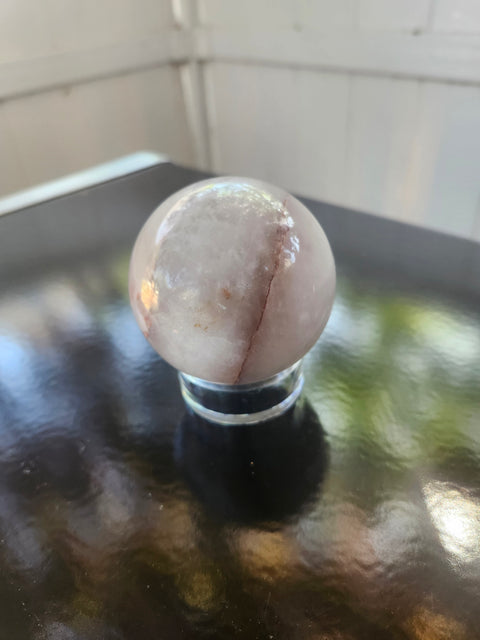 13 ounce, 64mm, 2.52 inch ferruginous quartz sphere