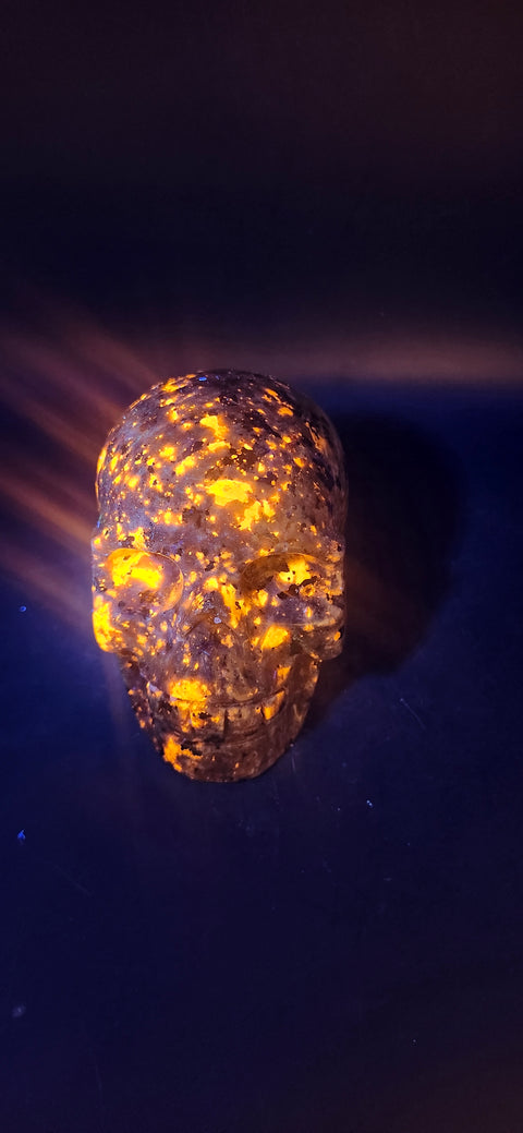 Flame stone "yooperlite" skull!! 3 inches tall, 3 long, 15 ounces