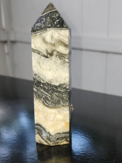 Striped calcite tower! 5.1 inches tall, 10 ounces