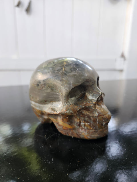Fruit jasper skull, 1.3 pounds, 3.75 inches long, 3 inches tall, 2.5 inches wide