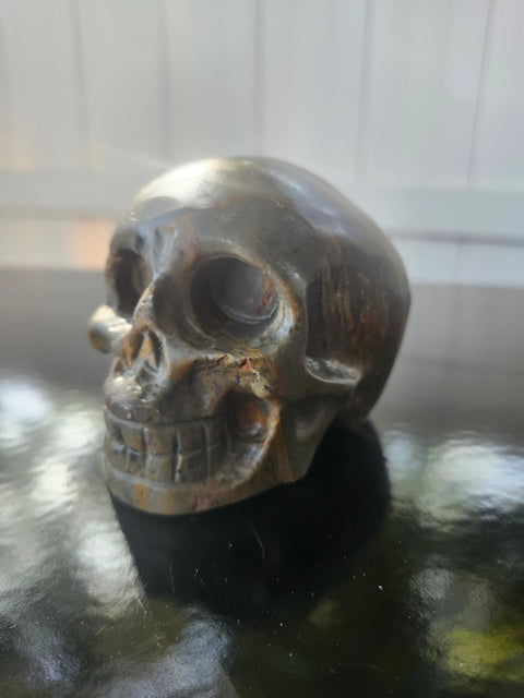 Green jasper skull, 1.4 pounds, 4 inches long, 3 inches tall, 3 inches wide