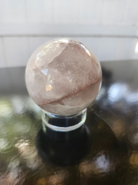 13 ounce, 64mm, 2.52 inch ferruginous quartz sphere