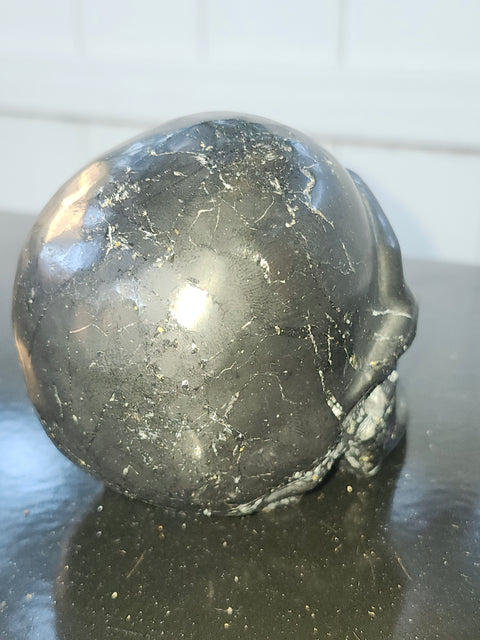 Shungite skull! 1.5 pounds, 4 inches long by 3.1 tall, 2.5 wide