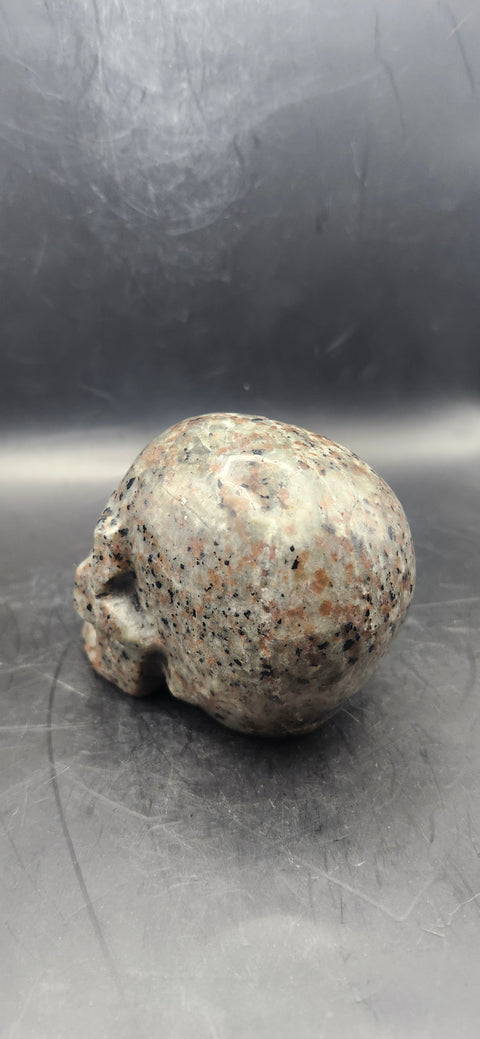 Flame stone "yooperlite" skull! 3 inchs tall, 3 long, 14 ounces