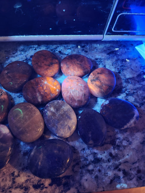 1.5 ounce, 1.75 inch sodalite palm stone uv reactive