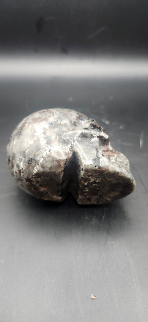 Mini flame stone skull. 5 ounces, 2.5 inches