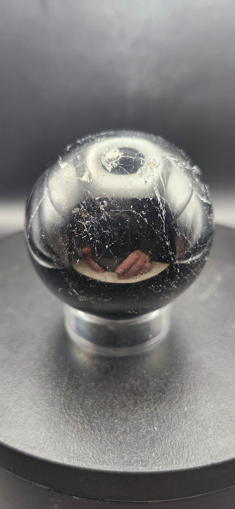 Black tourmaline sphere. 49.8mm, 1.96 inches, 7 ounces