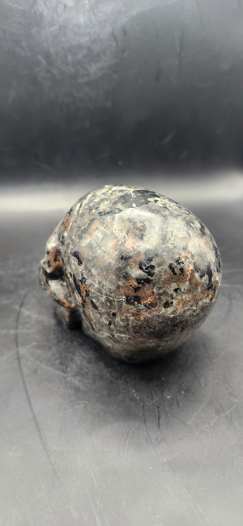 Flame stone "yooperlite" skull! 3 inches tall, 3 long, 14 ounces