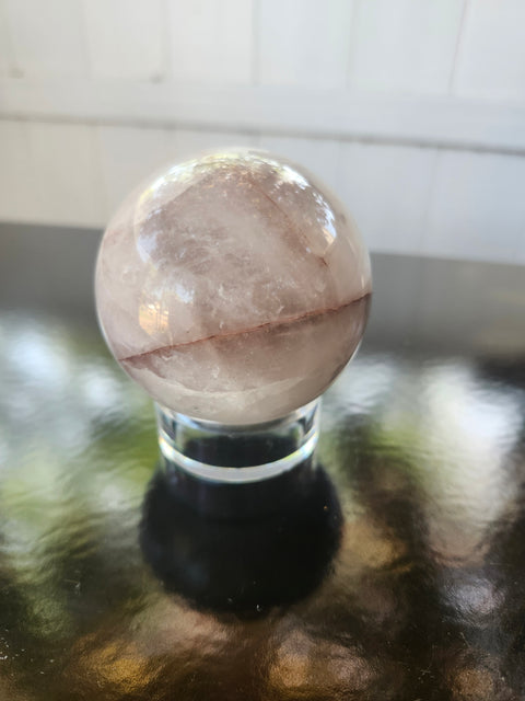 13 ounce, 64mm, 2.52 inch ferruginous quartz sphere