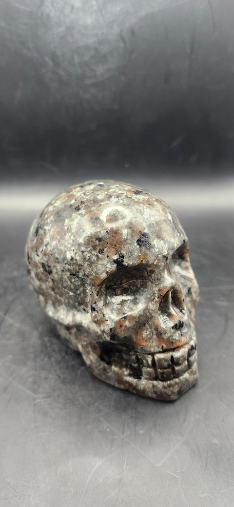 Flame stone " yooperlite" skull! 3 inches tall, 3 long, 14.7 ounces