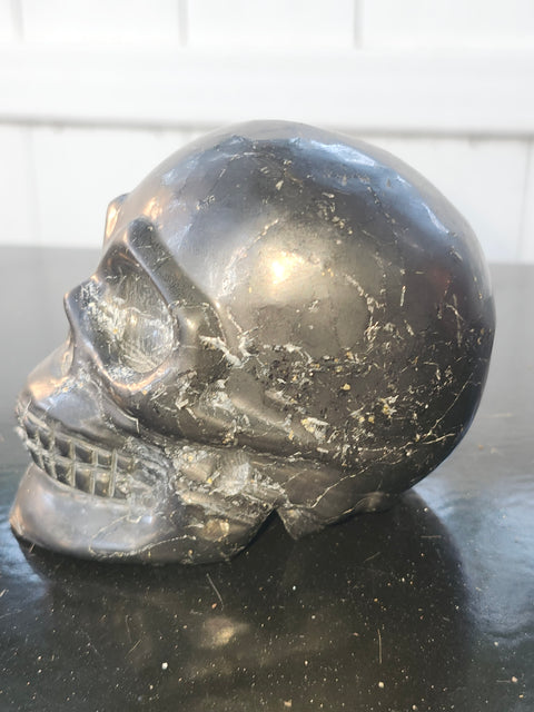 Shungite skull! 1.5 pounds, 4 inches long by 3.1 tall, 2.5 wide