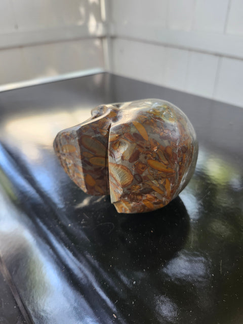 Fruit jasper skull, 1.3 pounds, 3.75 inches long, 3 inches tall, 2.5 inches wide