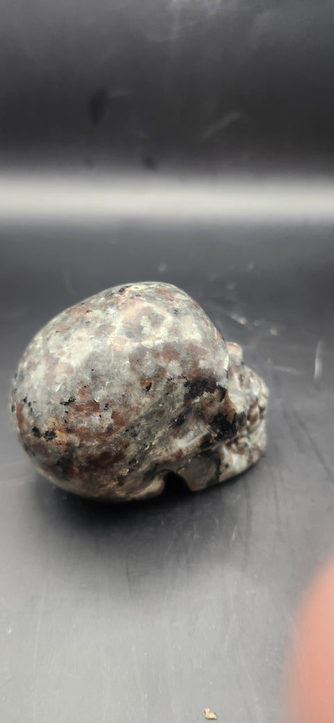 Mini flame stone skull. 5 ounces, 2.5 inches