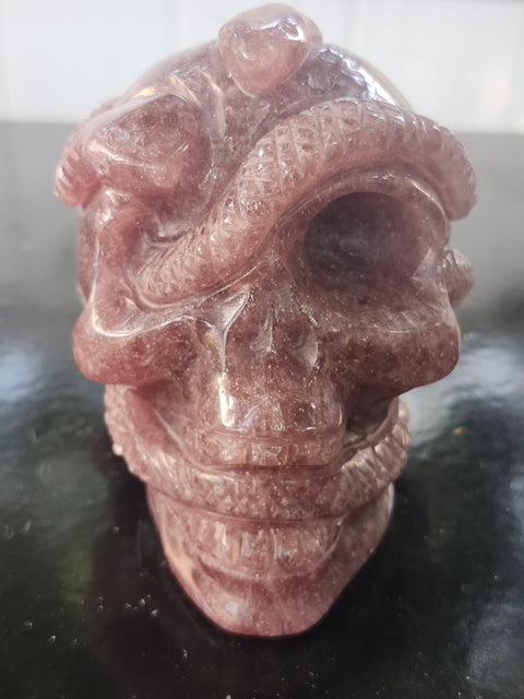 Strawberry quartz skull & snake! 1.6 pounds, 3.9 inches long, 3.3 tall, 2.7 wide