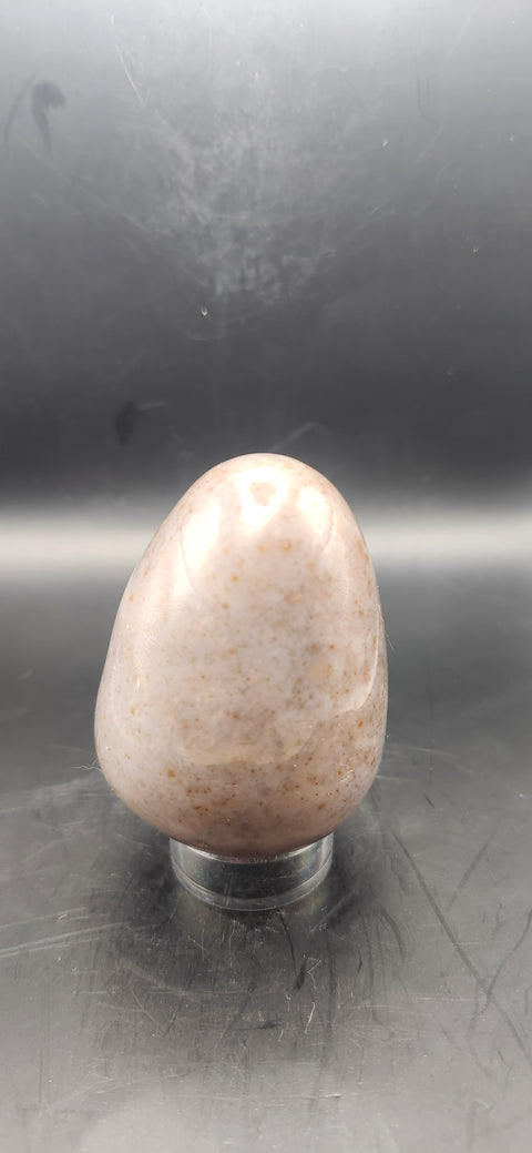 Sunstone egg. 9 ounces, 2.78 inches tall!
