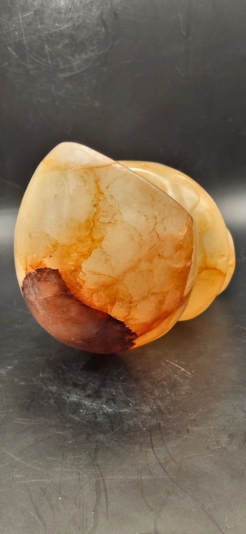 Fire quartz conch shell! 1.12 pounds, 5 inchs long, 2.7 wide
