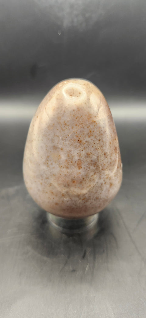 Sunstone egg. 9 ounces, 2.78 inches tall!