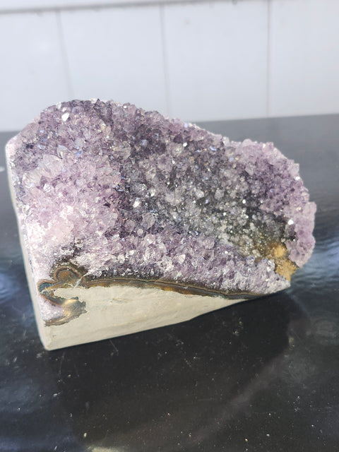 Amethyst cut base free from! 2.2 pounds, 4.8 inches tall, 3.3 inches wide