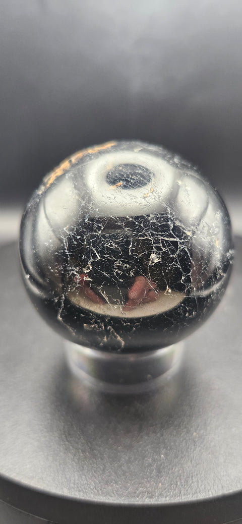 Black tourmaline sphere. 49.8mm, 1.96 inches, 7 ounces