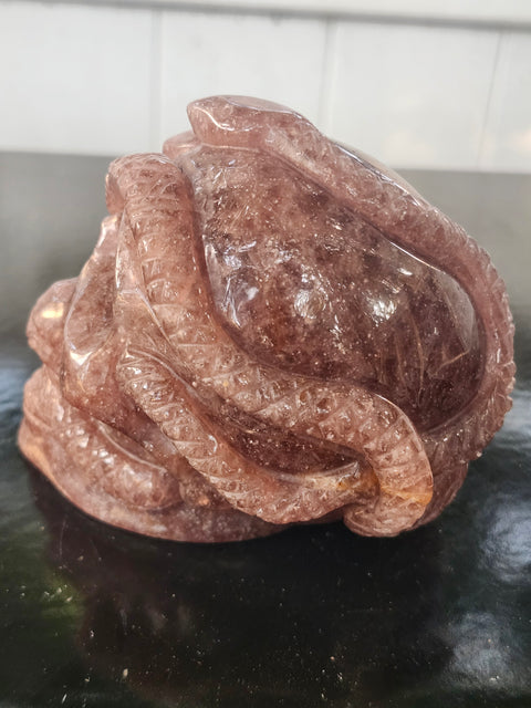 Strawberry quartz skull & snake! 1.6 pounds, 3.9 inches long, 3.3 tall, 2.7 wide