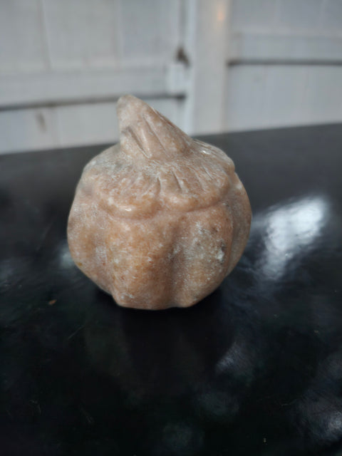 Orange calcite pumpkin. 9 ounces, 3 inches tall